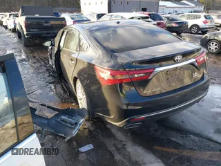 2016 Toyota Avalon Limited with VIN 4T1BK1EB5GU196535, listed as a IAAI auction lot 41670438 with 126,767 mi miles and . Bid and sale history available at DreamBid. Image 3.