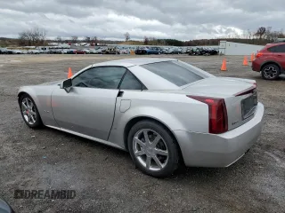 2006 Cadillac XLR z VIN 1G6YV36A765600759, wystawiony jako Copart lot #78984034 z przebiegiem 96 840 mil mil oraz Tytuł czysty. Historia ofert i sprzedaży dostępna na DreamBid. Obrazek 2.