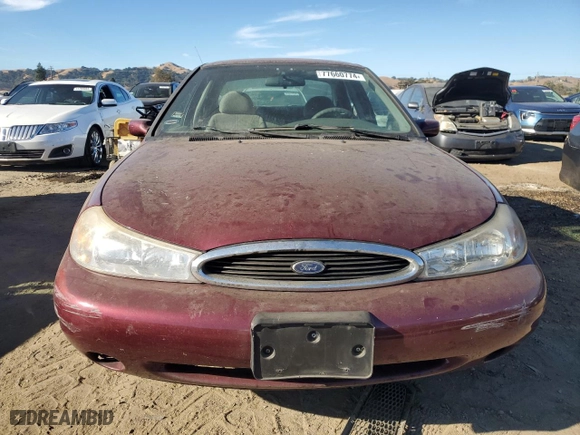 1998 Ford Contour SE with VIN 1FAFP6639WK279655, listed as a Copart auction lot 77660774 with NaN miles and Salvage Title. Bid and sale history available at carsss.com. Image 5.