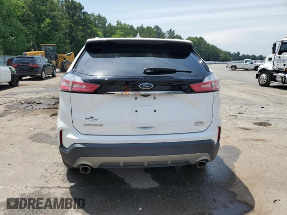 2020 Ford Edge SEL z VIN 2FMPK3J99LBA57125, wystawiony jako Copart lot #59915095 z przebiegiem 101 081 mil mil oraz Szkoda całkowita • Salvage title. Historia ofert i sprzedaży dostępna na DreamBid. Obrazek 6.
