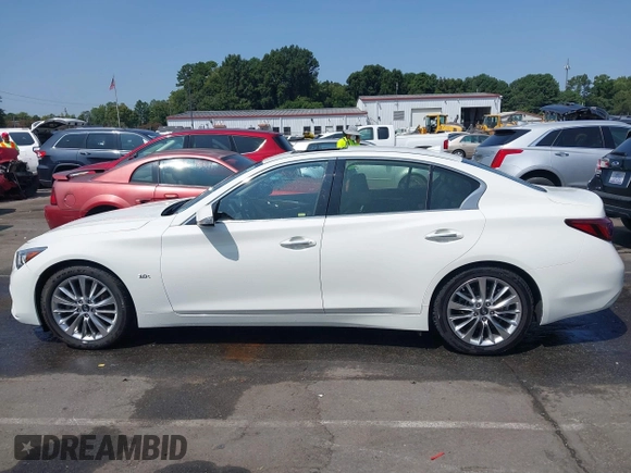 2019 Infiniti Q50 Luxe z VIN JN1EV7AP6KM518902, wystawiony jako IAAI lot #40292944 z przebiegiem 73 683 mil mil oraz . Historia ofert i sprzedaży dostępna na DreamBid. Obrazek 14.