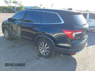 2021 Honda Pilot EX-L with VIN 5FNYF5H55MB044677, listed as a IAAI auction lot 42038704 with 38,684 mi miles and . Bid and sale history available at carsss.com. Image 3.