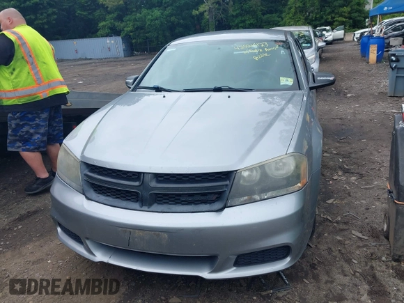 2014 Dodge Avenger SE with VIN 1C3CDZAB5EN149248, listed as a IAAI auction lot 42524423 with 120,974 mi miles and . Bid and sale history available at DreamBid. Image 6.