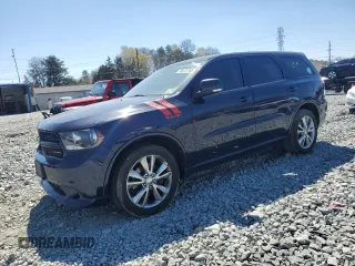 2012 Dodge Durango R/T z VIN 1C4SDJCT5CC195878, wystawiony jako Copart lot #50727765 z przebiegiem 217 623 mil mil oraz Czysty tytuł • Clean title. Historia ofert i sprzedaży dostępna na DreamBid. Obrazek 1.