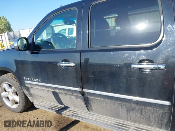 2012 Chevrolet Suburban LTZ with VIN 1GNSKKE74CR324578, listed as a IAAI auction lot 42129334 with 182,655 mi miles. Bid and sale history available at carsss.com. Image 14.