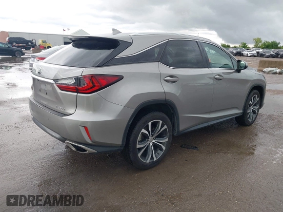 2017 Lexus RX 350 with VIN 2T2ZZMCA6HC081799, listed as a IAAI auction lot 42101809 with 85,650 mi miles and . Bid and sale history available at DreamBid. Image 4.