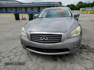2013 Infiniti M with VIN JN1BY1AR2DM601965, listed as a Copart auction lot 62014215 with 134,047 mi miles and Salvage title. Bid and sale history available at DreamBid. Image 13.