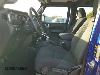 2020 Jeep Wrangler Unlimited Willys with VIN 1C4HJXDG0LW264742, listed as a Copart auction lot 73247804 with 31,745 mi miles and Salvage title. Bid and sale history available at DreamBid. Image 7.