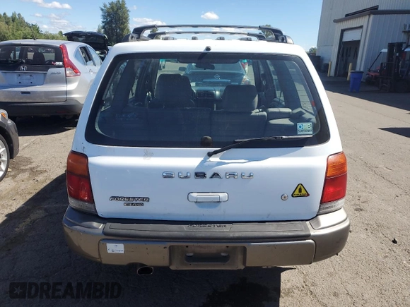 1999 Subaru Forester S with VIN JF1SF6557XH703160, listed as a Copart auction lot 60076974 with 0 mi miles and Salvage Title. Bid and sale history available at carsss.com. Image 6.