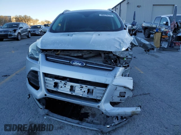 2016 Ford Escape Titanium with VIN 1FMCU9J95GUA69932, listed as a Copart auction lot 88470175 with 108,471 mi miles and Salvage title. Bid and sale history available at DreamBid. Image 5.