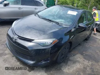 2018 Toyota Corolla L with VIN 2T1BURHE7JC018388, listed as a IAAI auction lot 42102862 with 111,882 mi miles and . Bid and sale history available at DreamBid. Image 2.
