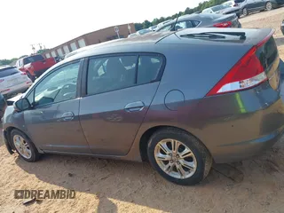 2010 Honda Insight EX with VIN JHMZE2H74AS027020, listed as a IAAI auction lot 42394875 with 248,003 mi miles and . Bid and sale history available at DreamBid. Image 14.