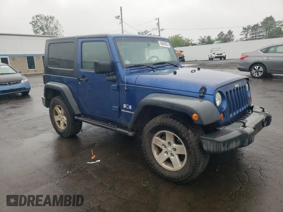 2009 Jeep Wrangler X with VIN 1J4FA24109L712701, listed as a Copart auction lot 60800855 with 156,709 mi miles and Salvage title. Bid and sale history available at DreamBid. Image 4.