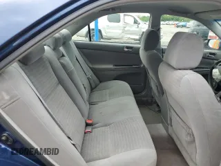 2005 Toyota Camry LE z VIN 4T1BE30K95U072730, wystawiony jako Copart lot #56398505 z przebiegiem 115 917 mil mil oraz Czysty tytuł • Clean title. Historia ofert i sprzedaży dostępna na DreamBid. Obrazek 10.