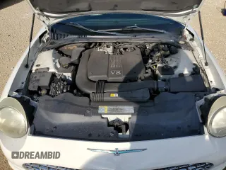 2002 Ford Thunderbird Hardtop Premium z VIN 1FAHP60A92Y103048, wystawiony jako Copart lot #73916924 z przebiegiem 75 396 mil mil oraz Szkoda całkowita • Salvage title. Historia ofert i sprzedaży dostępna na DreamBid. Obrazek 11.