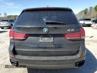 2014 BMW X5 xDrive50i with VIN 5UXKR6C51E0J73170, listed as a Copart auction lot 49260175 with 129,625 mi miles and Salvage Title. Bid and sale history available at carsss.com. Image 6.