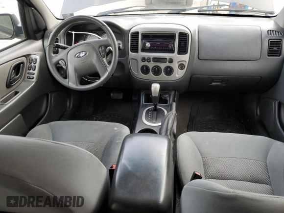 2006 Ford Escape XLT with VIN 1FMYU03136KD47701, listed as a Copart auction lot 58008695 with 176,341 mi miles and Salvage title. Bid and sale history available at DreamBid. Image 8.