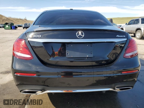 2018 Mercedes-Benz E 300 with VIN WDDZF4KBXJA464197, listed as a Copart auction lot 53205215 with 38,002 mi miles and Salvage title. Bid and sale history available at DreamBid. Image 6.