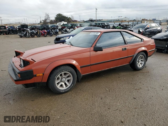 1983 Toyota Supra with VIN JT2MA67L9D0056034, listed as a Copart auction lot 82382484 with 39,338 mi miles and Salvage title. Bid and sale history available at DreamBid. Image 1.