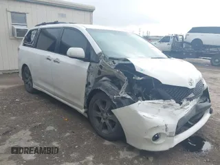 2015 Toyota Sienna SE with VIN 5TDXK3DC7FS599287, listed as a IAAI auction lot 41565671 with 111,626 mi miles. Bid and sale history available at carsss.com. Image 1.
