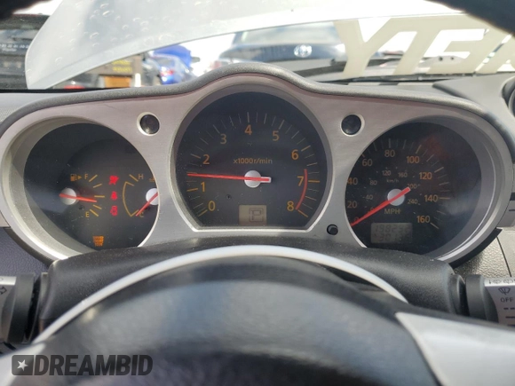 2003 Nissan 350Z Touring z VIN JN1AZ34E23T003943, wystawiony jako Copart lot #55221405 z przebiegiem 198 292 mil mil oraz Szkoda całkowita • Salvage title. Historia ofert i sprzedaży dostępna na DreamBid. Obrazek 9.