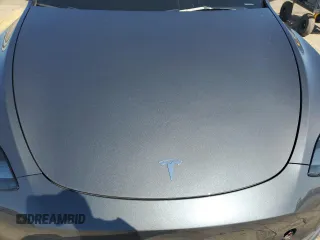 2023 Tesla Model Y Performance z VIN 7SAYGDEF9PF865129, wystawiony jako Copart lot #50228735 z przebiegiem Nie podano mil oraz Szkoda całkowita • Salvage title. Historia ofert i sprzedaży dostępna na DreamBid. Obrazek 12.