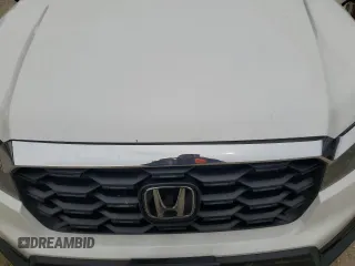 2023 Honda Passport EX-L z VIN 5FNYF8H51PB033343, wystawiony jako Copart lot #56594665 z przebiegiem 18 554 mil mil oraz Szkoda całkowita • Salvage title. Historia ofert i sprzedaży dostępna na DreamBid. Obrazek 12.