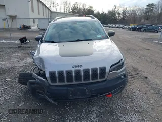 2019 Jeep Cherokee Trailhawk with VIN 1C4PJMBX5KD103259, listed as a IAAI auction lot 41704861 with 39,923 mi miles and . Bid and sale history available at DreamBid. Image 12.
