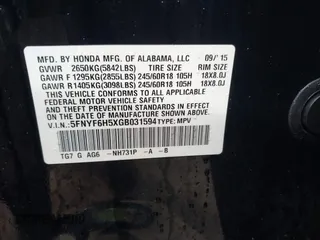 2016 Honda Pilot EX-L with VIN 5FNYF6H5XGB031594, listed as a IAAI auction lot 40409867 with 132,227 mi miles. Bid and sale history available at carsss.com. Image 9.