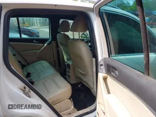 2014 Volkswagen Tiguan SEL with VIN WVGAV3AX7EW022239, listed as a IAAI auction lot 42381670 with 180,729 mi miles and . Bid and sale history available at DreamBid. Image 8.