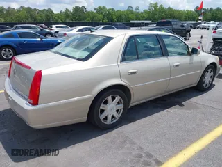 2008 Cadillac DTS 1SC with VIN 1G6KD57Y38U100381, listed as a IAAI auction lot 42173059 with 146,669 mi miles and . Bid and sale history available at carsss.com. Image 4.