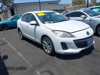 2013 Mazda 3 i SV with VIN JM1BL1TG1D1793789, listed as a IAAI auction lot 42452233 with 153,591 mi miles and . Bid and sale history available at DreamBid. Image 1.