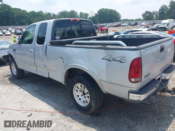 2000 Ford F-150 XL with VIN 1FTRX18L1YNA13975, listed as a IAAI auction lot 42397187 with 235,471 mi miles and . Bid and sale history available at DreamBid. Image 3.