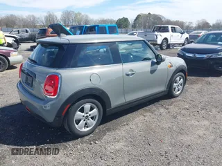 2019 MINI Hardtop Cooper with VIN WMWXP5C55K2H29830, listed as a IAAI auction lot 41808669 with 60,588 mi miles and . Bid and sale history available at DreamBid. Image 4.