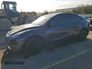 2023 Tesla Model Y Long Range z VIN 7SAYGDEEXPF609525, wystawiony jako Copart lot #52171775 z przebiegiem Nie podano mil oraz Szkody całkowita. Historia ofert i sprzedaży dostępna na DreamBid. Obrazek 1.