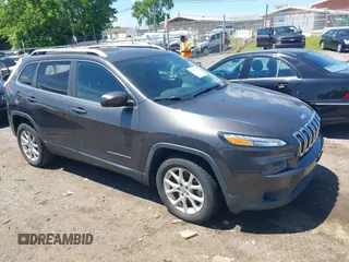 2014 Jeep Cherokee Latitude with VIN 1C4PJLCS0EW297415, listed as a IAAI auction lot 42198645 with 160,268 mi miles. Bid and sale history available at carsss.com. Image 1.