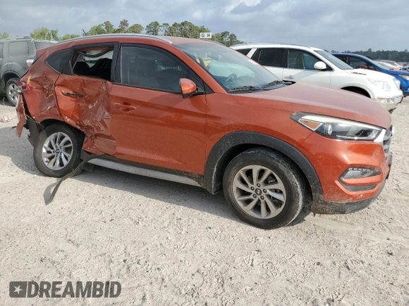2017 Hyundai Tucson SE z VIN KM8J33A42HU486275, wystawiony jako Copart lot #53658145 z przebiegiem 31 928 mil mil oraz Szkoda całkowita • Salvage title. Historia ofert i sprzedaży dostępna na DreamBid. Obrazek 4.