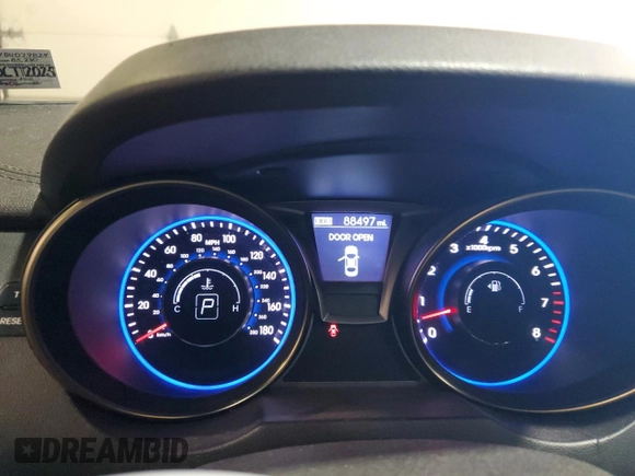 2013 Hyundai Genesis Coupe R-Spec with VIN KMHHU6KJ7DU079824, listed as a Copart auction lot 61663785 with 88,497 mi miles and Salvage title. Bid and sale history available at DreamBid. Image 9.