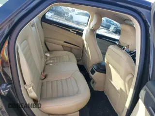 2013 Ford Fusion SE Hybrid с VIN 3FA6P0LU6DR157953, выставлен на аукционе Copart как лот 61175825 с пробегом 125 768 миль миль и Чистый • Clean title. История ставок и продаж доступна на DreamBid. Изображение 10.
