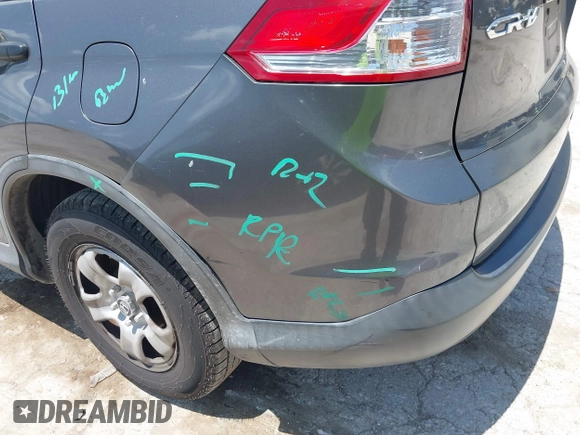2013 Honda CR-V LX with VIN 3CZRM3H37DG708916, listed as a IAAI auction lot 42450090 with 118,002 mi miles and . Bid and sale history available at DreamBid. Image 17.