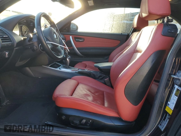 2013 BMW 1 Series 135i with VIN WBAUC9C54DVM13873, listed as a Copart auction lot 82657734 with 78,021 mi miles and Salvage title. Bid and sale history available at DreamBid. Image 7.