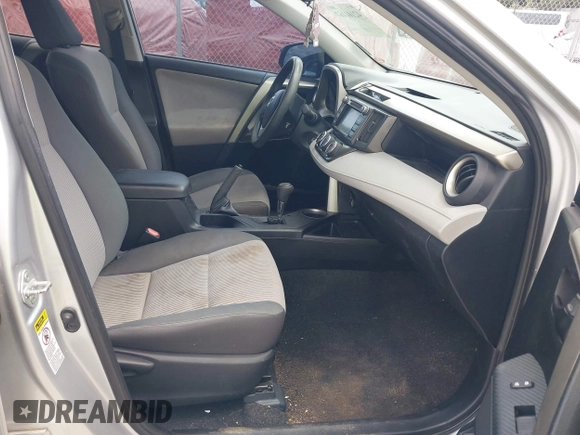 2014 Toyota RAV4 LE with VIN 2T3BFREV1EW143929, listed as a IAAI auction lot 42101167 with 124,076 mi miles and . Bid and sale history available at DreamBid. Image 5.