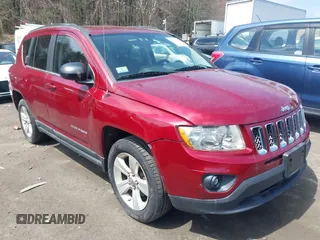 2011 Jeep Compass Latitude with VIN 1J4NT1FB8BD170401, listed as a IAAI auction lot 42094953 with 122,617 mi miles. Bid and sale history available at carsss.com. Image 1.