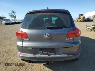 2014 Volkswagen Tiguan SEL with VIN WVGAV3AX0EW555873, listed as a Copart auction lot 55695955 with 69,984 mi miles and Salvage title. Bid and sale history available at DreamBid. Image 6.