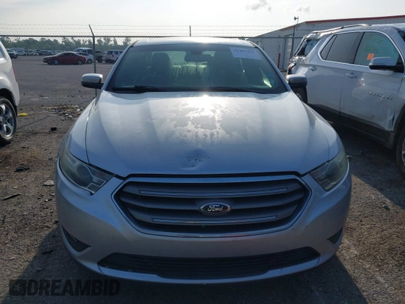 2015 Ford Taurus SEL with VIN 1FAHP2E85FG174242, listed as a IAAI auction lot 42407291 with 108,852 mi miles and . Bid and sale history available at DreamBid. Image 12.
