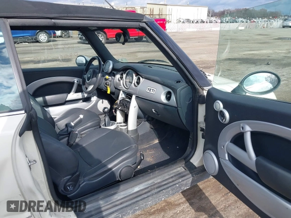 2006 MINI Convertible with VIN WMWRF33566TF65410, listed as a IAAI auction lot 40813052 with 131,109 mi miles and . Bid and sale history available at DreamBid. Image 5.
