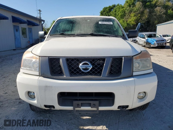 2012 Nissan Titan S with VIN 1N6AA0EJ1CN319995, listed as a Copart auction lot 52573765 with Not Provided miles and Non Repairable. Bid and sale history available at carsss.com. Image 5.