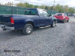 2003 Ford F-150 XL with VIN 1FTRX17223NB22897, listed as a IAAI auction lot 42166965 with 207,627 mi miles and . Bid and sale history available at DreamBid. Image 4.