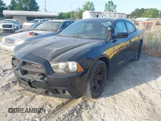 2012 Dodge Charger Police z VIN 2C3CDXAG3CH262847, wystawiony jako IAAI lot #42167010 z przebiegiem 123 274 mil mil oraz . Historia ofert i sprzedaży dostępna na DreamBid. Obrazek 2.