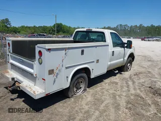 2013 Ford Super Duty F-250 SRW XL with VIN 1FDBF2B63DEA18579, listed as a IAAI auction lot 42136145 with 221,134 mi miles. Bid and sale history available at carsss.com. Image 4.